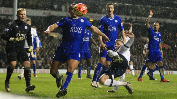 Leicester City's Danny Drinkwater moves to clear the ball under pressure from Tottenham Hotspur's Toby Alderweireld.