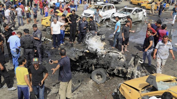 The aftermath of suicide car bombing in Sadr City on Tuesday.