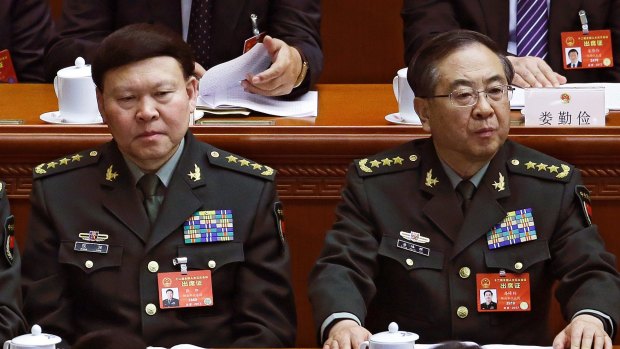 Zhang Yang, left, then head of the People's Liberation Army political affairs department, and Fang Fenghui, then chief of the general staff of the PLA in March.