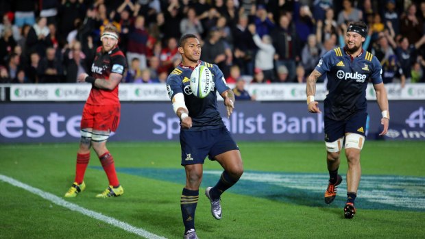 Waisake Naholo of the Highlanders celebrates after scoring against the Crusaders on Friday.