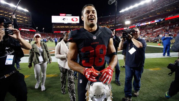 Relief: Jarryd Hayne walks off the field after the 49ers beat the Minnesota Vikings.
