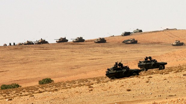 Border line: Turkish tanks take up position on the Turkish-Syrian border.