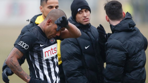 Targeted: Partizan Belgrade's Brazilian player Everton Luiz leaves the field at the weekend.