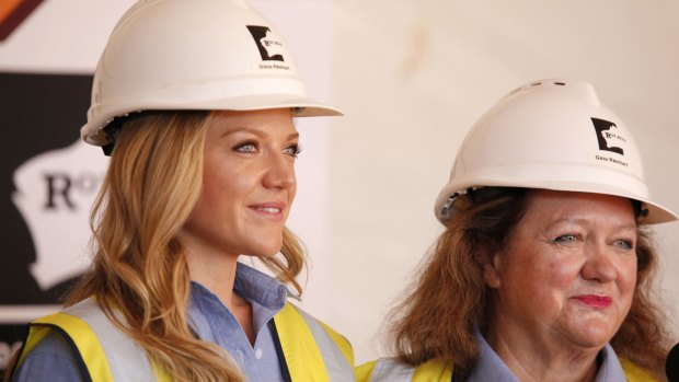 Her timing wasn't great but Gina Rinehart, pictured with daughter Ginia, farewelled the first ore from her Roy Hill project in December.