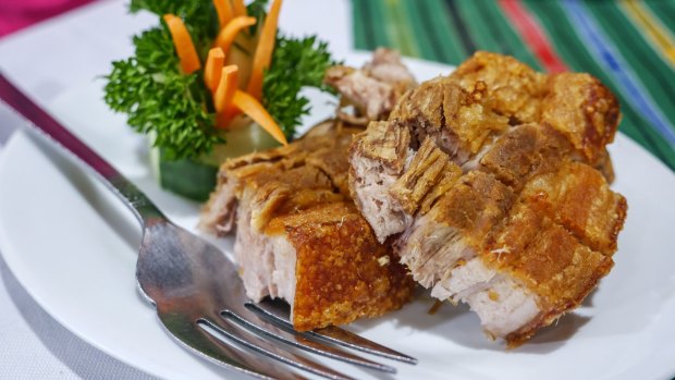 For lechon, the roasted pork is dipped in a rich sauce of mashed pigs' liver, vinegar, brown sugar, garlic and onion.