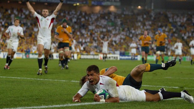 Career highlight: Jason Robinson scores for England in the World Cup final against Australia in Sydney in November 2003.