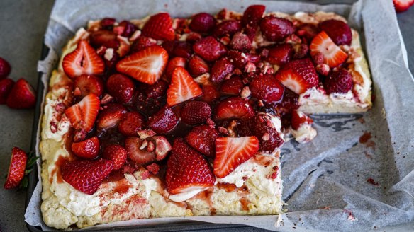 Lemonade scone slab with strawberry jam, cream and fresh strawberries.