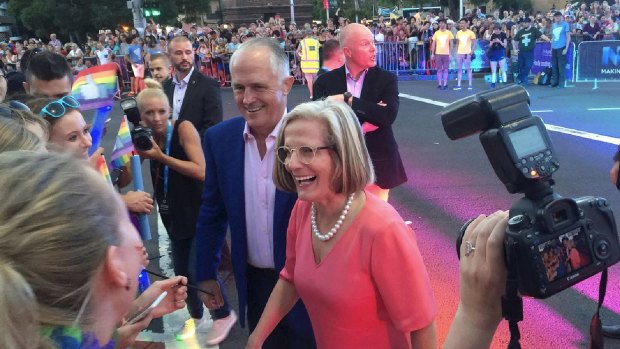 Prime Minister Malcolm Turnbull and wife Lucy greet revellers on Oxford Street at for Mardi Gras, ahead of not doing anything serious about marriage equality.