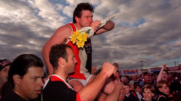 Danny Frawley is chaired off after his last game for St Kilda.