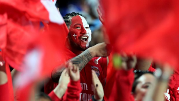 Shocking the world: Tongan fans celebrate in Hamilton.