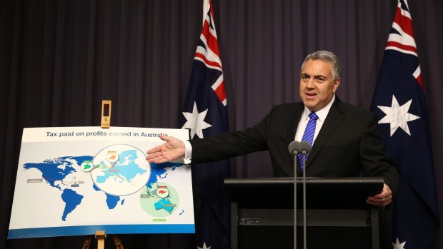 Treasurer Joe Hockey announces the new tax measures on Monday. 