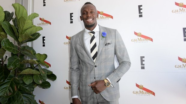 Usain Bolt in the Mumm marquee at the Birdcage.