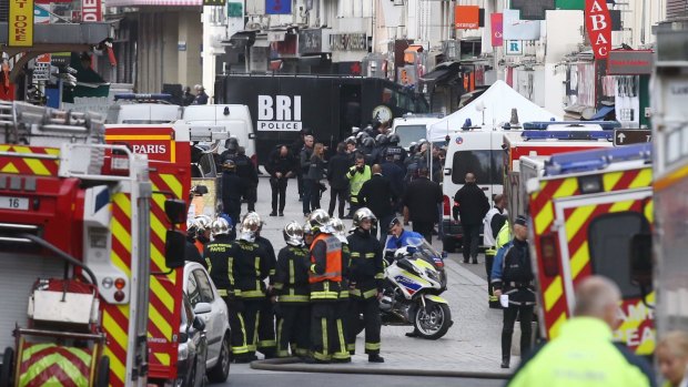 Military and police conduct an operation in Saint-Denis on Wednesday.