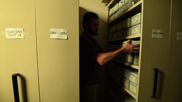 This room fitted with sliding filing cabinets, similar to those used in doctors' and lawyers' offices, contains around 800 boxes of cremated human remains that have not been collected by families. 