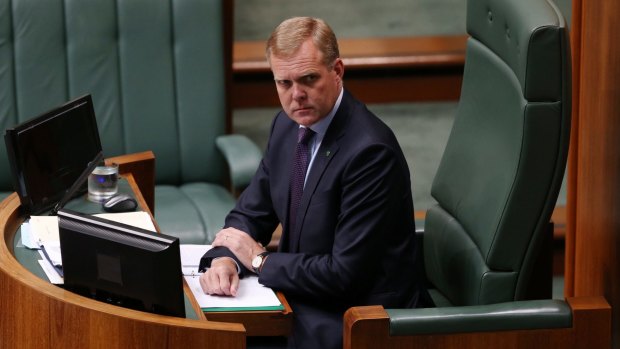 It is Speaker Tony Smith's job to maintain order in the House of Representatives.