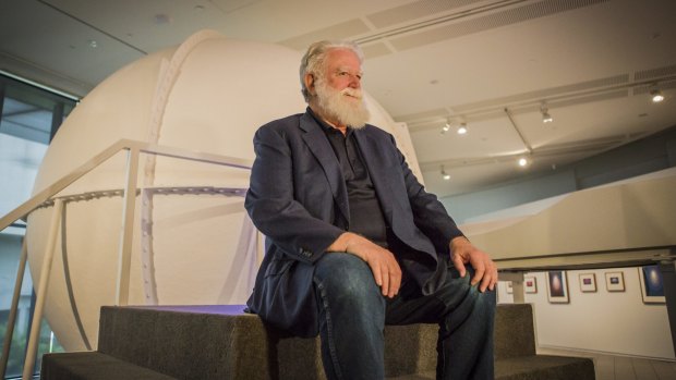 James Turrell sitting in front of the Perceptual Cell.
