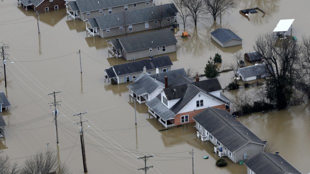 Homes surrounded by floodwater in Pacific, Missouri. 