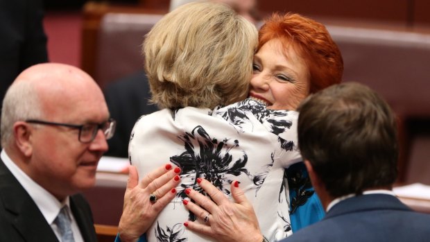 In happier times: Senator Michaelia Cash hugged Senator Pauline Hanson after her first speech in the Senate on Wednesday.