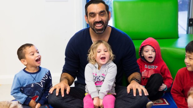 Adam Goodes with children at the Waranwarin Early Learning Centre in Campbelltown. 