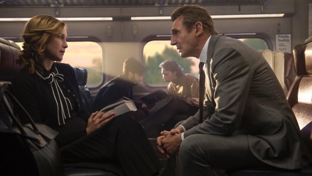 Vera Farmiga, left, issues Liam Neeson a challenge in <i>The Commuter</i>.