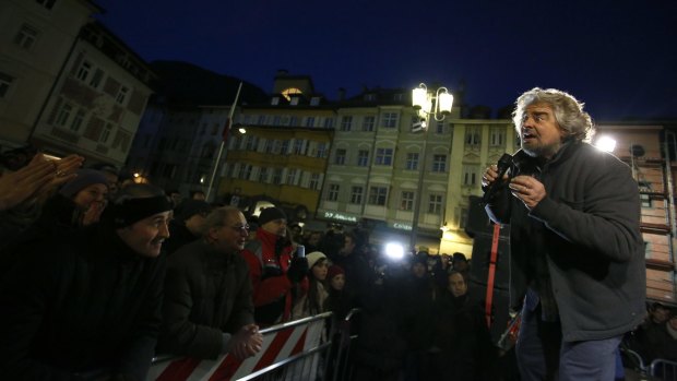 Beppe Grillo, comedian-turned-politician and leader of the 5-Star Movement, speaks during an election campaign rally in Trento, Italy.