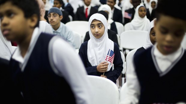 Children wait for President Barack Obama during his visit to the Islamic Society of Baltimore.