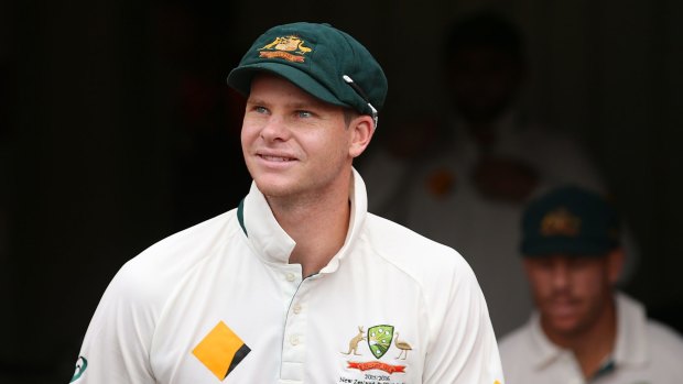 Australia captain Steve Smith leads his team out during the Brisbane Test.