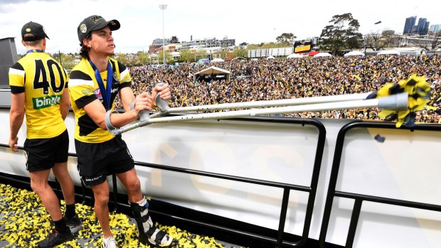 Rioli was on crutches for Richmond's premiership celebrations. 