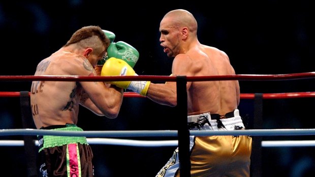 Danny Green (left) and Anthony Mundine go head to head in May 2006. 