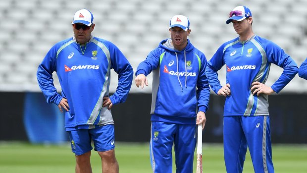 Coach Darren Lehmann (left) doesn't think the pay dispute influenced Australia's Champions Trophy performance.
