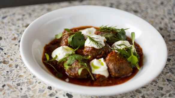 Kafta meatballs, tomato sauce and labneh.