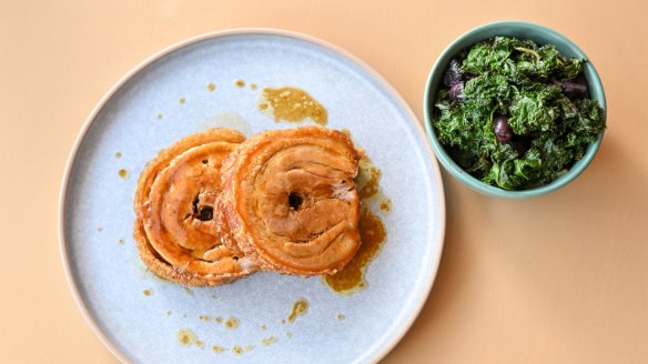 Porchetta with kale and grape salad.