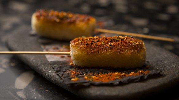 Kiritanpo (miso glazed rice skewers).