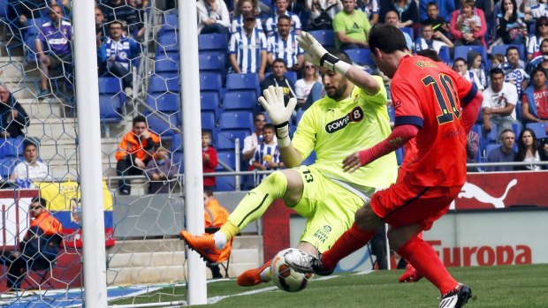Lionel Messi scores against Espanyol.