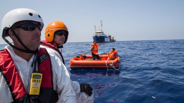 A rescue crew from MSF's Dignity I vessel search for survivors.