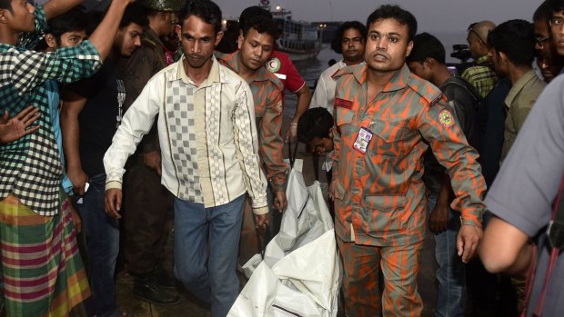 Rescue workers at the scene of Bangladesh's latest ferry disaster on Sunday.