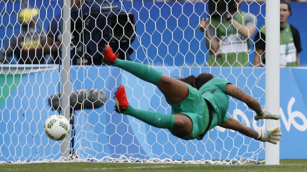 Brazil goalkeeper Barbara fails to block a penalty kick by Sweden's Lisa Dahlkvist 