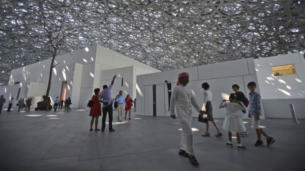 People visit the Louvre Museum during the public opening day, in Abu Dhabi, United Arab Emirates, in November.