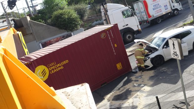 The container stuck under the bridge