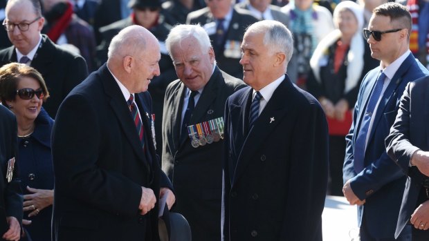 Governor-General Sir Peter Cosgrove and Prime Minister Malcolm Turnbull attended the national ceremony for the 50th anniversary of the Battle of Long Tan in Canberra on Thursday.