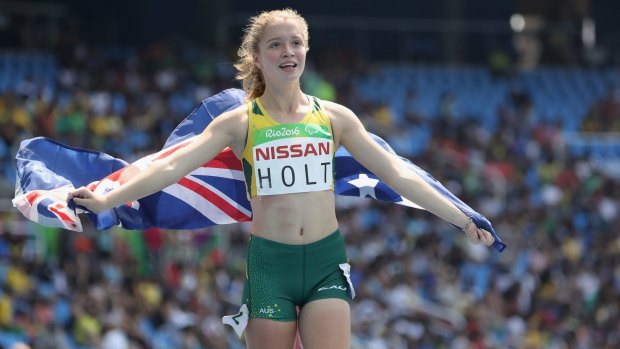 Isis Holt of Australia celebrates winning the silver medal in the Women's 100m - T35.