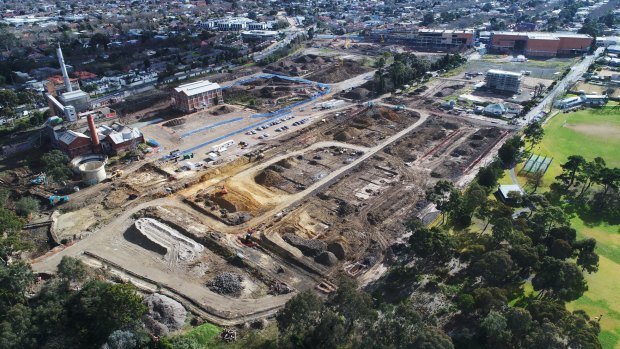 About two-thirds of the Alphington site is being developed, but asbestos concerns may delay the remaining corner, near the Chandler Highway and the Yarra River. 