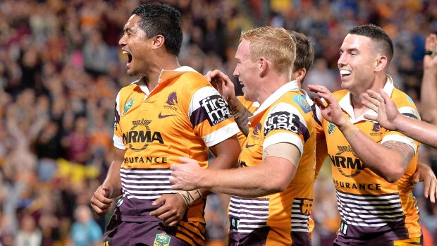 Celebrations: Anthony Milford scores a try during the NRL First Preliminary Final match between the Brisbane Broncos and the Sydney Roosters at Suncorp Stadium.