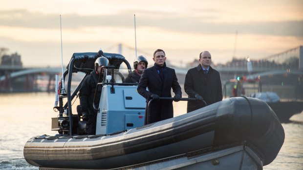 Bond (Daniel Craig) and Tanner (Rory Kinnear) passing the CNS building aboard the rib on the River Thames in London in  <i>Spectre</i>.