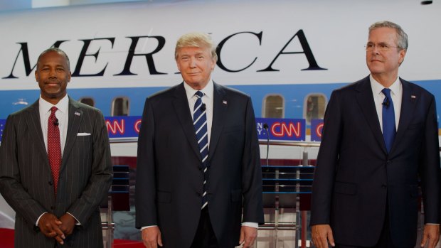 Front runner: Donald Trump is flanked by Ben Carson, who is second in most polls, and the Republican establishment's favourite, Jeb Bush.