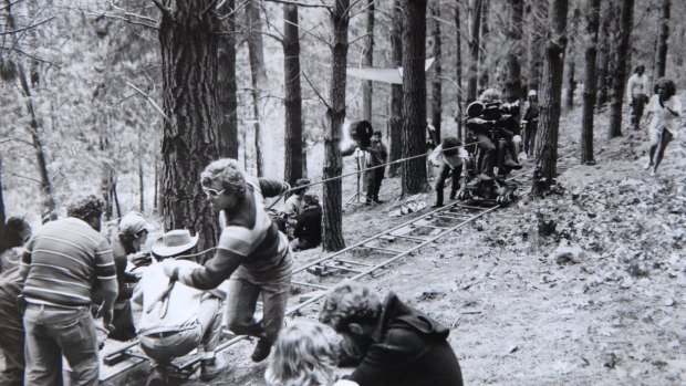 Crew set up for a scene in the woods.