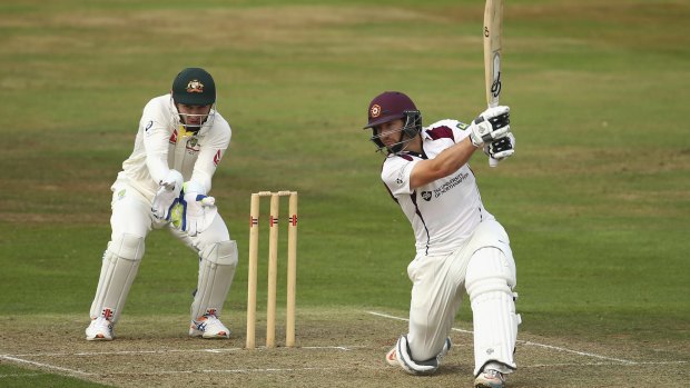 Flaying the bowlers: Northamptonshire's Adelaide-born batsman Steven Crook bats as Australian keeper Peter Nevill looks on during day two of the tour match at The County Ground in Northampton.