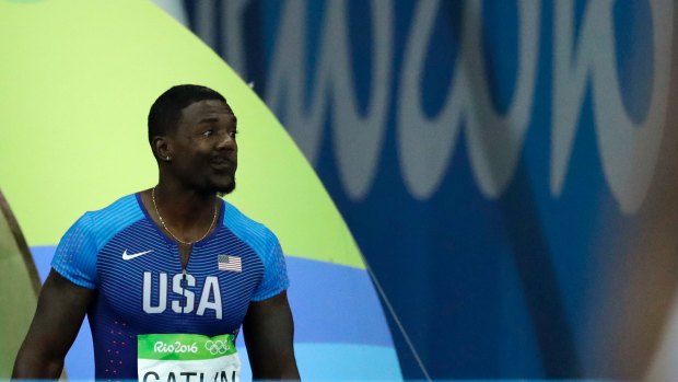 United States' Justin Gatlin makes a face as he is booed when entering the stadium for the men's 100m final in Rio on Sunday.