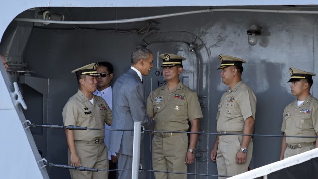 US President Barack Obama aboard the Philippines navy frigate, Gregorio del Pilar, in Manila on Tuesday.