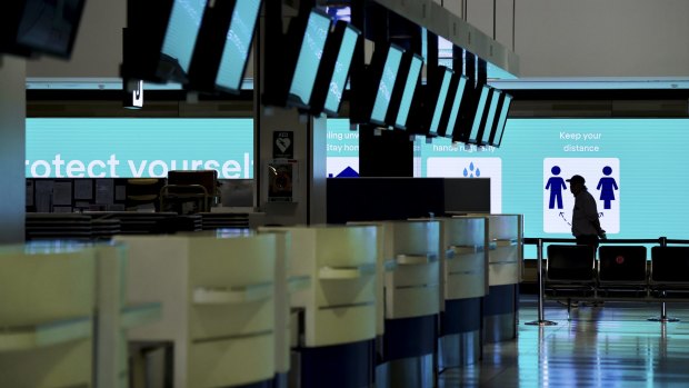 Closed check-in counters at Sydney Airport's international terminal.
